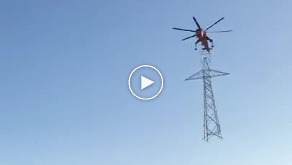 Ювелирная установка ЛЭП вертолетом в Канаде