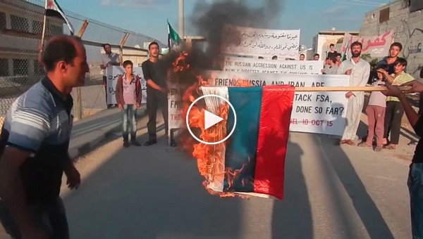 В Сирии сожгли флаг России